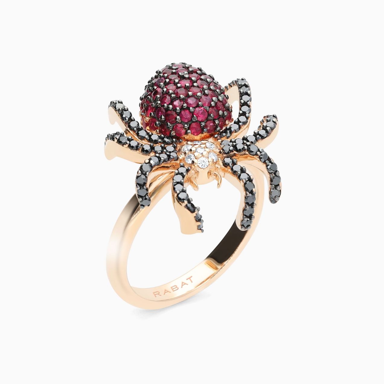 Rose gold spider ring with diamonds and rubies