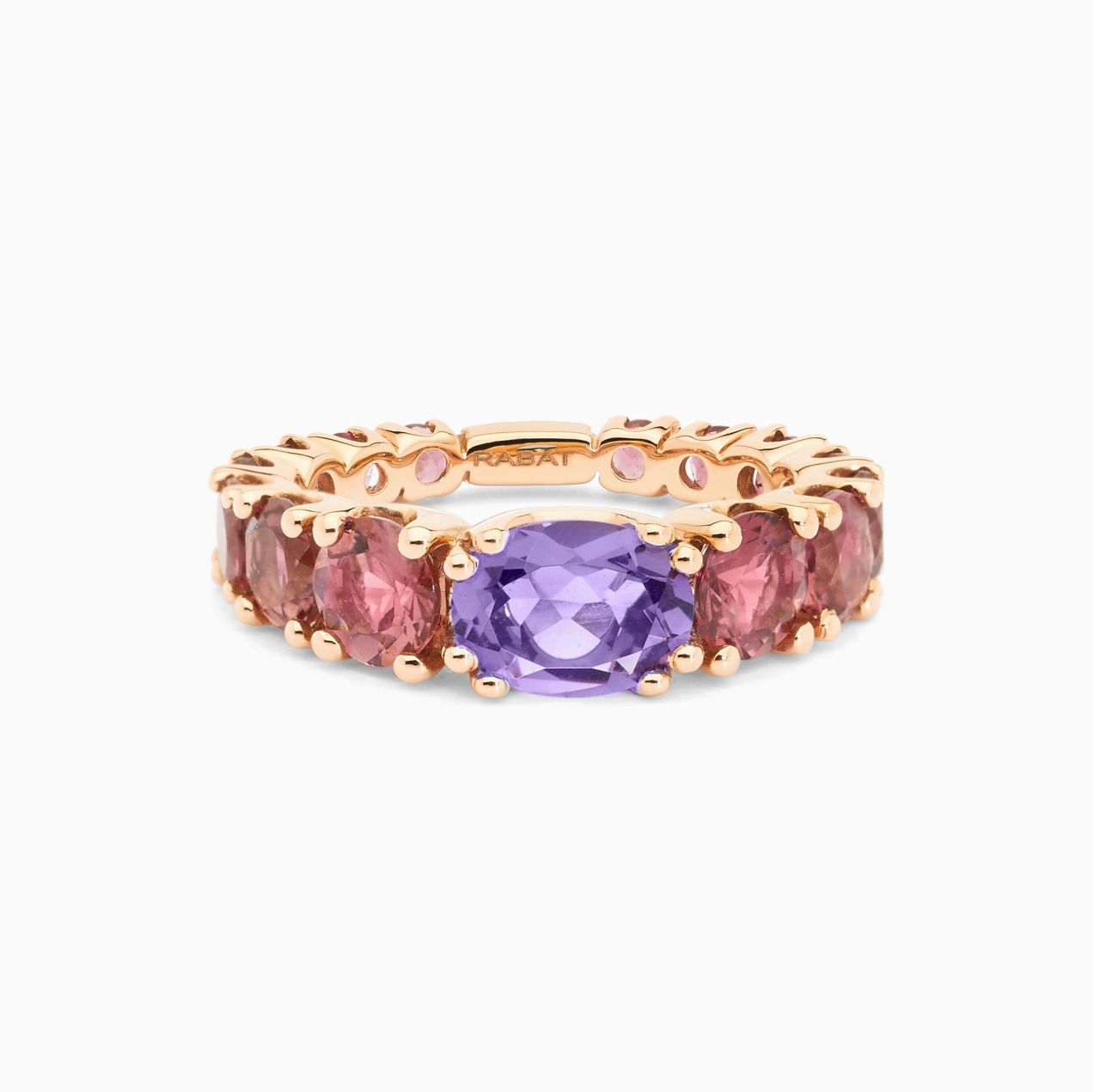 Rose gold with amethyst in the center solitaire ring