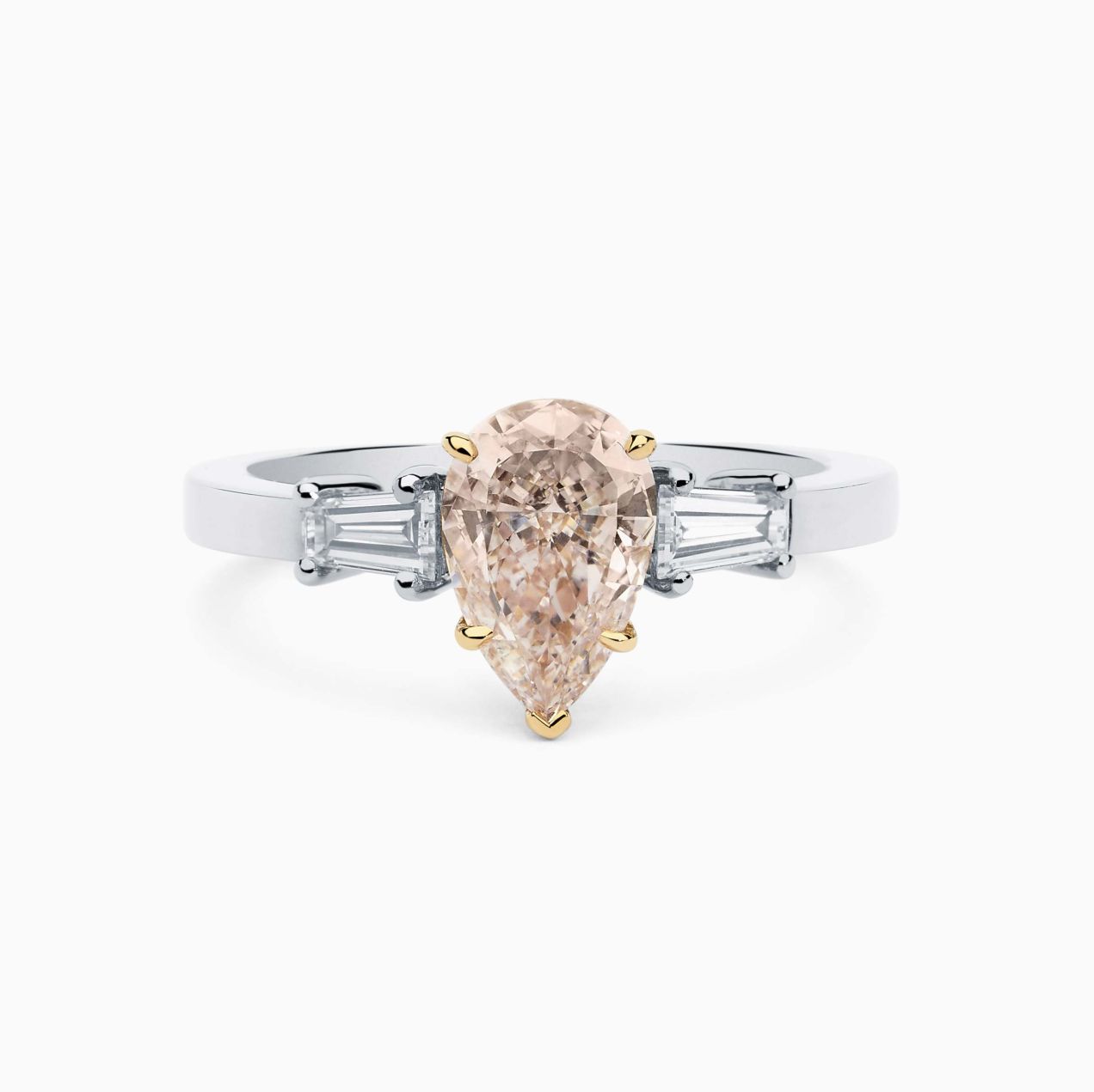 Platinum with pink fancy diamond in the center solitaire ring