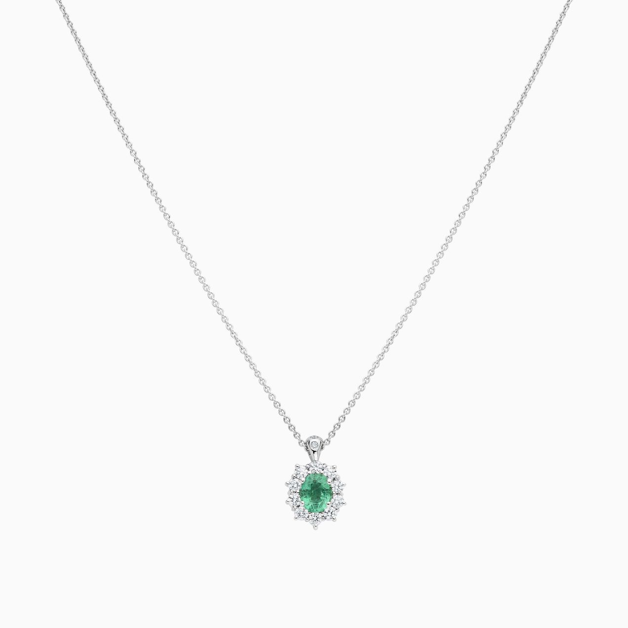 Emerald and diamonds pendant