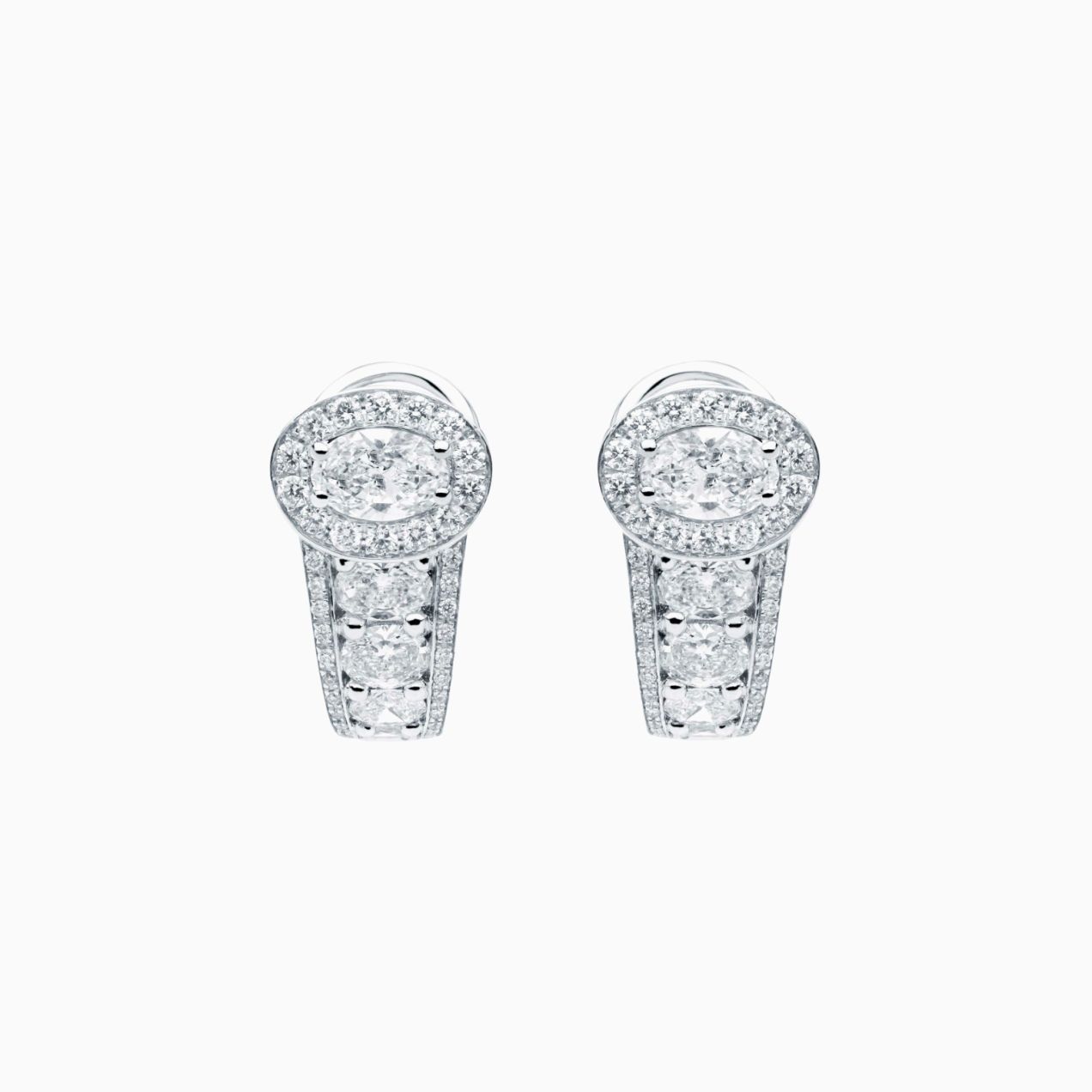 White gold earrings with central diamond size oval