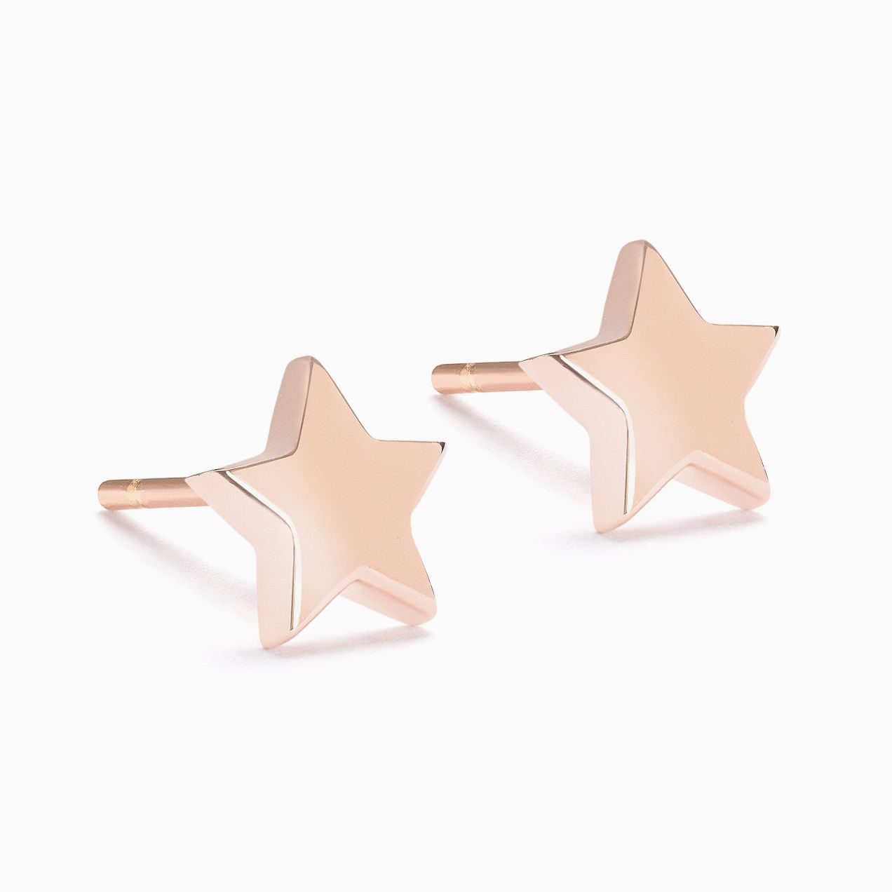 Pendientes infantiles de oro rosa con forma de estrella