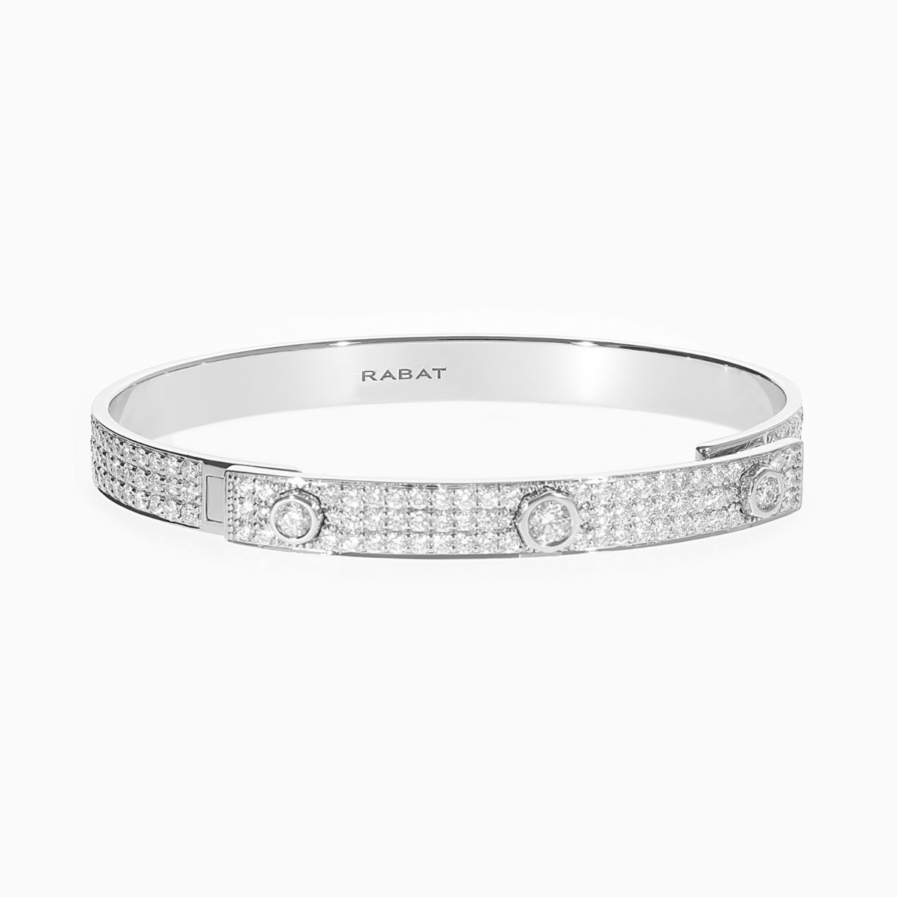 Rigid bracelet in white gold with three central diamonds and pavé-set diamonds